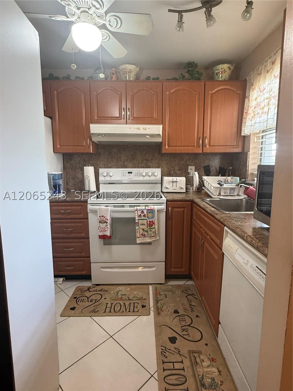 Photo of 9001 Sunrise Lakes Blvd #201, Sunrise, FL 33322 (MLS # A12065243)