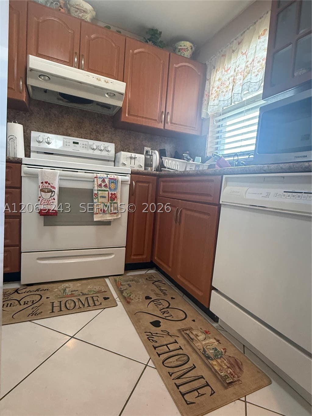 Photo of 9001 Sunrise Lakes Blvd #201, Sunrise, FL 33322 (MLS # A12065243)