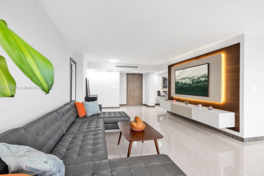 Stunning 2BD, 2BA apartment in Sunny Isles Beach, expertly renovated with high-end finishes and Italian craftsmanship. The open-concept layout features sleek, high-gloss cabinetry, soft-close drawers, polished quartz countertops, premium stainless steel appliances, custom tray smooth  ceilings with LED lighting and porcelain tile flooring, washer and dryer in the unit. All windows and the balcony are new  impact, The guest bedroom, converted to a den, can easily be restored. Located in the desirable Winston Towers, walk to the beach, luxury shopping, dining, and more. Enjoy building amenities such as a gym, heated pool, and community ballroom. Well-maintained with completed 40-year inspection. Maintenance includes internet, hot water, and basic cable. Free shuttle service adds convenience.