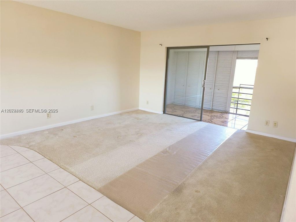 Photo of 4140 NW 44th Ave #411, Lauderdale Lakes, FL 33319 (MLS # A12022440)