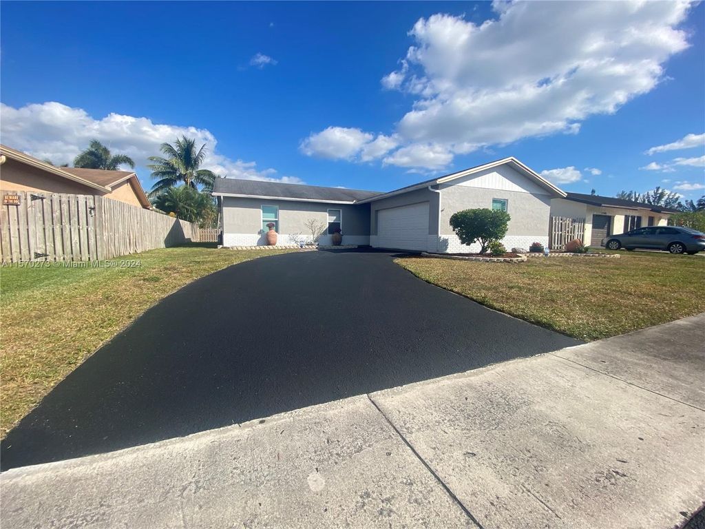 Photo of 2120 NW 111th Ave, Sunrise, FL 33322 (MLS # A11570273)