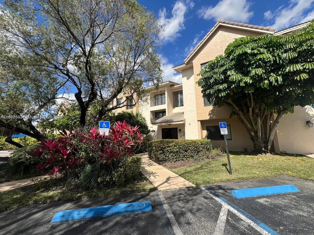 Photo of 10001 W Atlantic Blvd #317, Coral Springs, FL 33071 (MLS # A11892832)