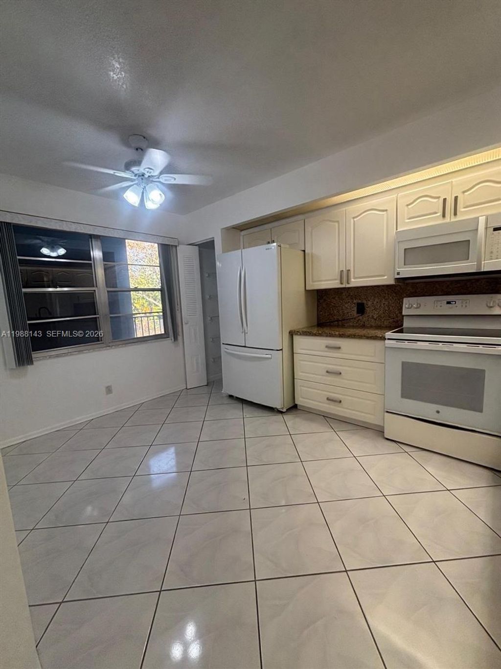 Photo of 12600 SW 5th Ct #208L, Pembroke Pines, FL 33027 (MLS # A11988143)