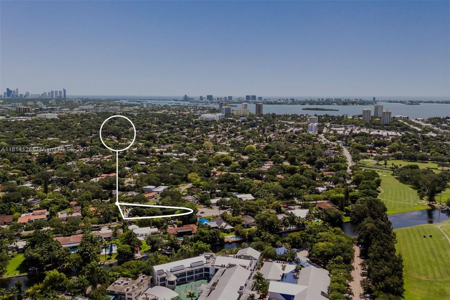 Discover a rare half-acre (27,219 sq. ft.) corner lot in Biscayne Park, one of Miami’s top neighborhoods. On a serene, tree-lined street, this cleared lot offers a family-friendly retreat just a 5-minute drive from elite schools like Barry University, Miami Country Day School, and David Lawrence Jr. K-8. Zoned for single-family use, this expansive parcel is ideal for a custom luxury estate with a pool or gardens. Surrounded by upscale homes and greenery, it’s a gem for buyers seeking privacy and prestige. Near Bal Harbour Shops, beaches, and downtown Miami via I-95, this lot is a smart investment with rising property values.