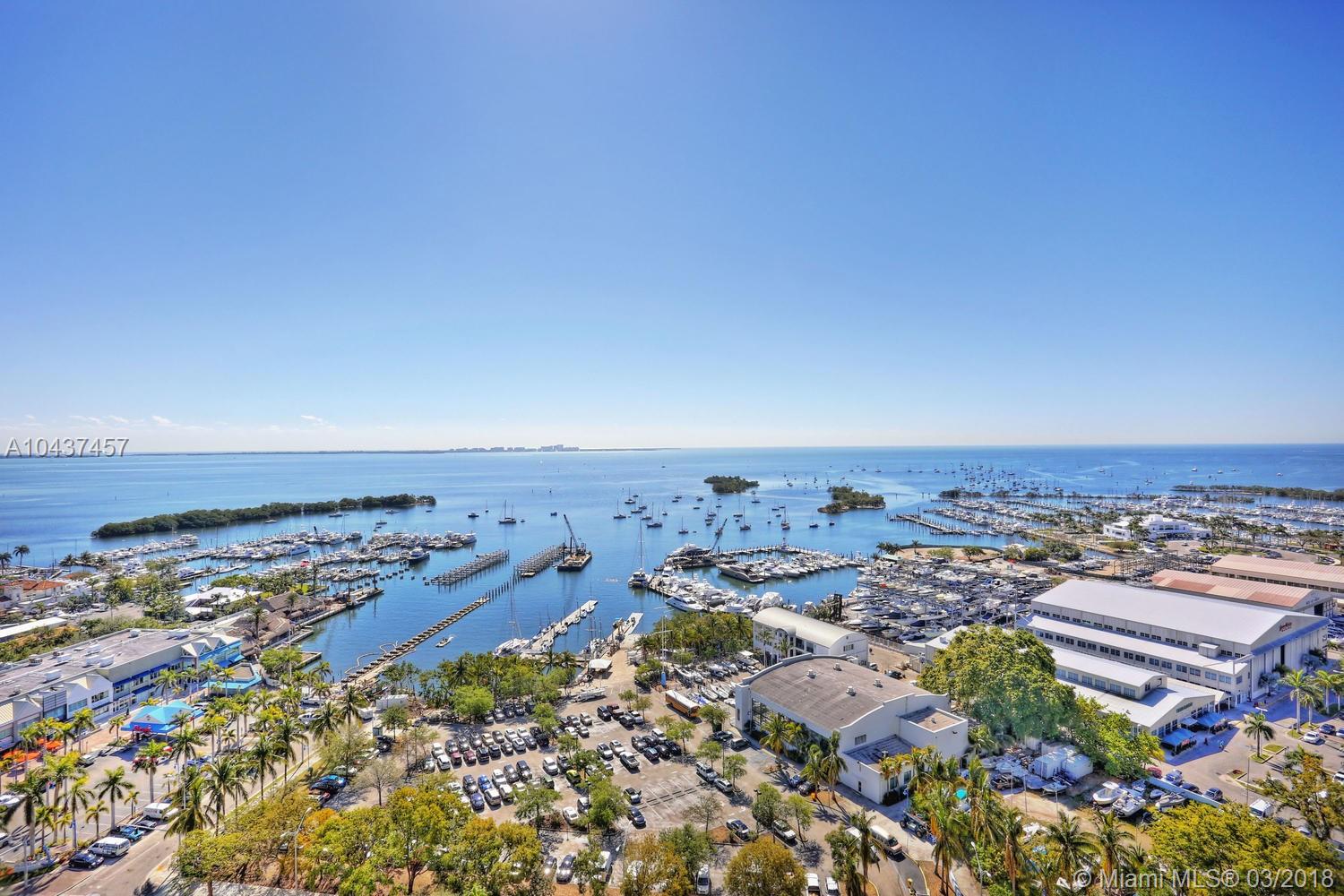Stunning residence in the exclusive Grovenor House, a landmark building just steps from the Grove village center’s boutiques, cafes and bayfront parks & marinas. Private elevator foyer opens to light-filled living spaces w/ walls of glass, 10’ ceilings & spectacular unobstructed views of Biscayne Bay. Flow-through floor plan offers 4026 SFLA + 700 SF of terraces that encircle the unit. European kitchen w/ center island, high-end appliances & adjacent breakfast area. Luxurious master suite features room size walk-in closet & spa-like marble bath w/ soaking tub. Experience a tranquil lifestyle & extraordinary building amenities including 24 hr. concierge, state-of-the-art fitness center, full-service spa, heated infinity edge pool w/private cabanas, tennis court & children’s play areas.