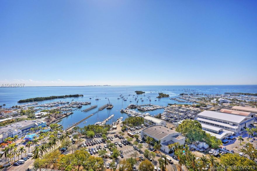 Stunning residence in the exclusive Grovenor House, a landmark building just steps from the Grove village center&#x2019;s boutiques, cafes and bayfront parks & marinas. Private elevator foyer opens to light-filled living spaces w/ walls of glass, 10&#x2019; ceilings & spectacular unobstructed views of Biscayne Bay. Flow-through floor plan offers 4026 SFLA + 700 SF of terraces that encircle the unit. European kitchen w/ center island, high-end appliances & adjacent breakfast area. Luxurious master suite features room size walk-in closet & spa-like marble bath w/ soaking tub. Experience a tranquil lifestyle & extraordinary building amenities including 24 hr. concierge, state-of-the-art fitness center, full-service spa, heated infinity edge pool w/private cabanas, tennis court & children&#x2019;s play areas.