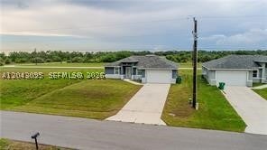 Tiny photo for 106 Plantation Dr, La Belle, FL 33935 (MLS # A12043095)