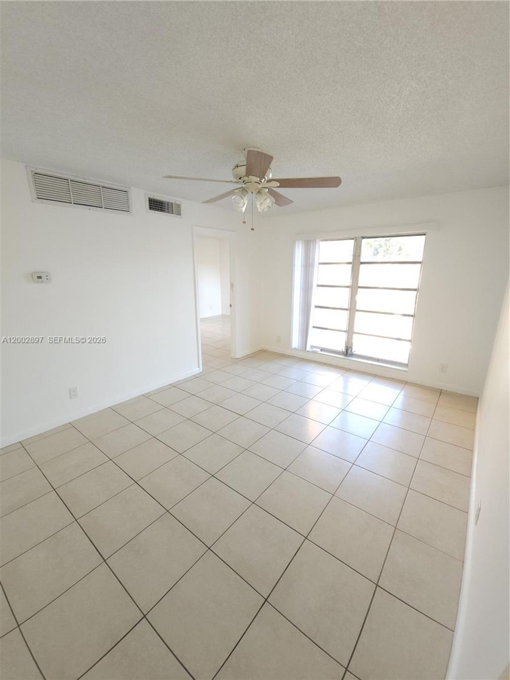 Photo of 4505 Treehouse Ln #8-H, Tamarac, FL 33319 (MLS # A12002897)