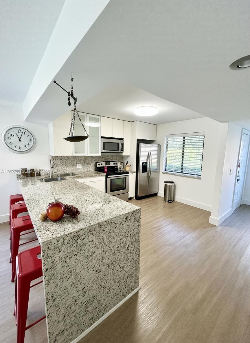 RACQUET CLUB APTS AT BONA - Residential