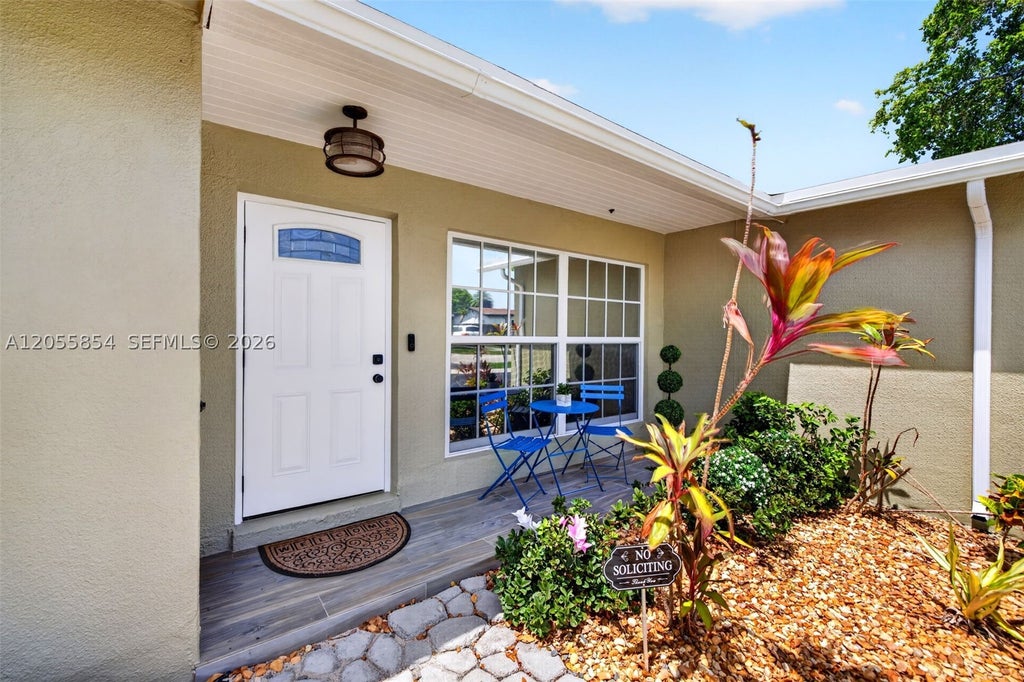 Photo of 11371 NW 37th Pl, Sunrise, FL 33323 (MLS # A12055854)