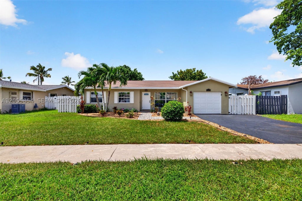 Photo of 11371 NW 37th Pl, Sunrise, FL 33323 (MLS # A12055854)