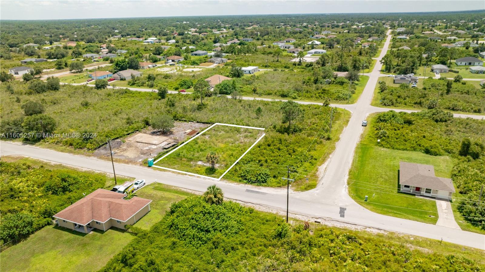 Exclusively presented by Sunland Real Estate: Seize the opportunity to own a stunning quarter-acre (.25 acre) lot in Lehigh Acres, Lee County's rapidly expanding residential community. Perfectly situated minutes away from East LaBelle and Fort Myers, this lot is cleared and ready for development and is also near River Hall Country Club. Whether you're looking to build your dream home or seeking an investment in a flourishing location, this lot presents an unparalleled chance to create something special in Southwest Florida. Seller would want to use Vantage Title for closing.