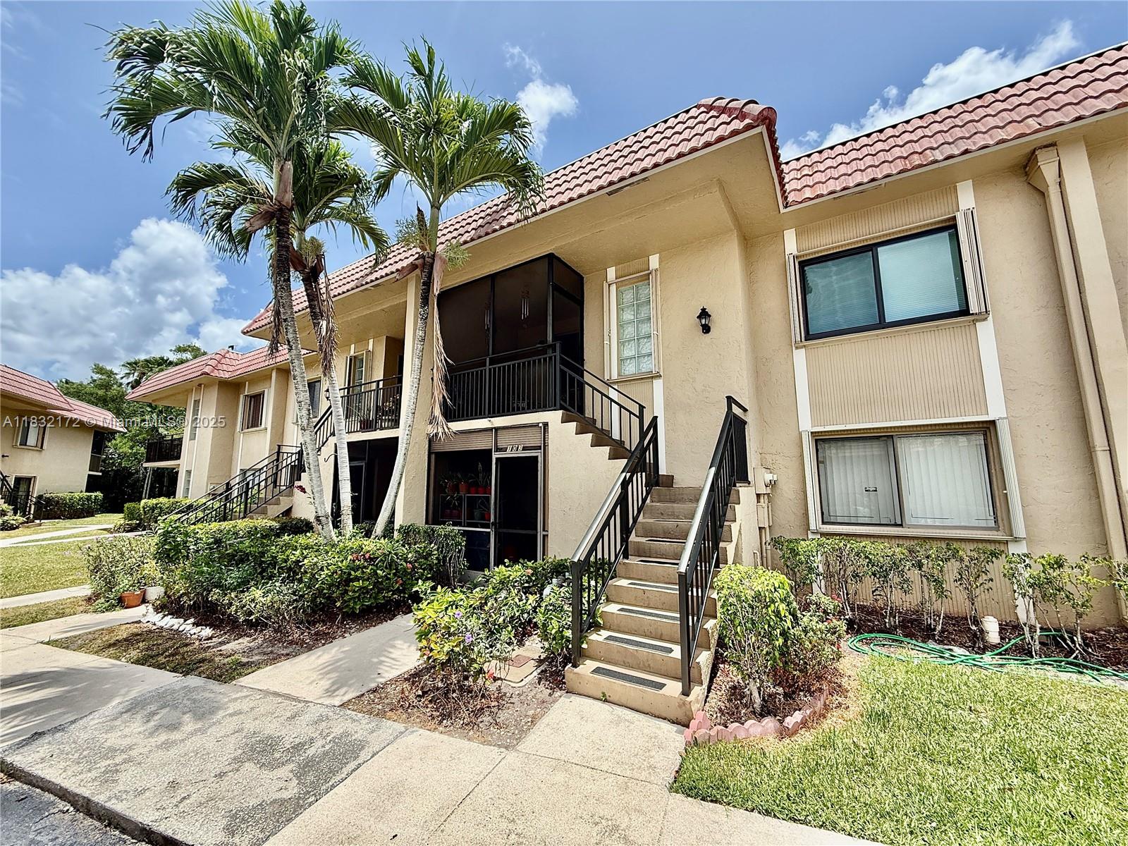 Spacious & impeccably maintained 2BR garden apartment on the 2nd floor with tranquil water views. Features tile & hardwood floors, impact windows & entry door, accordion shutters, updated baths, A/C, water heater, appliances & electrical panel. Ceiling fans & room-darkening pleated blinds in every room, stackable washer/dryer, screened porch & balcony with storage closet. One assigned parking spot in front + guest spaces. Maintenance dues include water, cable TV & Internet! Association finances in order, and the **40-year inspection is complete** Enjoy a community pool & full access to Bonaventure Town Center Club—gym, tennis, racquetball, bowling, skating, basketball, 2 pools, kids' splash area & more! Leasing is allowed after 1 year of ownership.