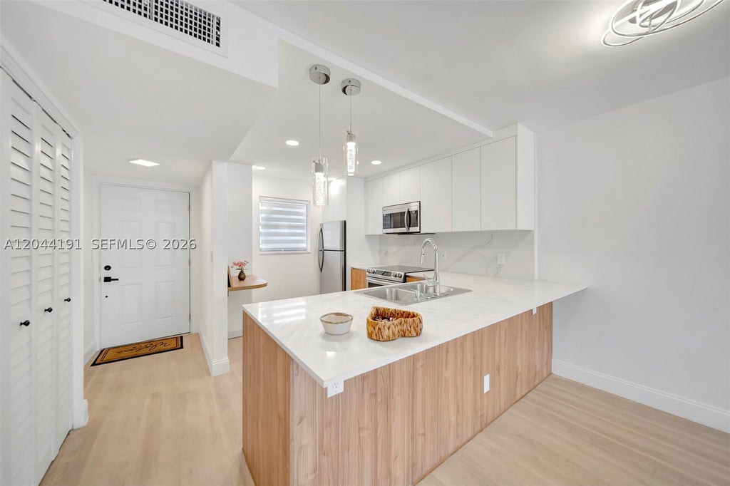 Photo of 3100 Holiday Springs Blvd #111, Margate, FL 33063 (MLS # A12044191)