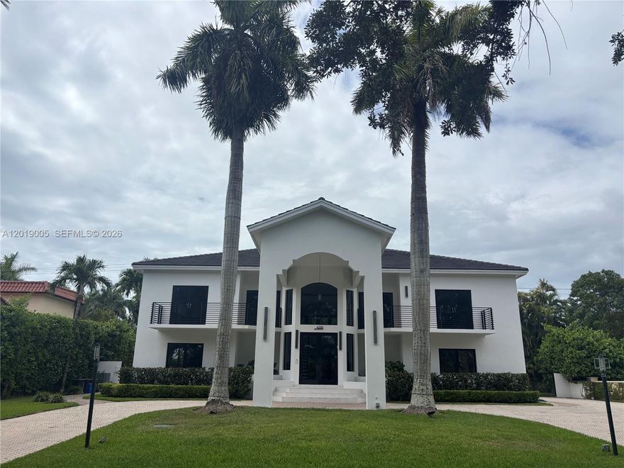 Premier location in the exclusive, guard-gated waterfront Kings Bay community of only 150 homes in Coral Gables. This modern 2 story 5 bedroom 4 1/2 bath residence has been completely renovated and offers a unique design for multigenerational living featuring 3 bedrooms 2 1/2 baths upstairs and 2 bedrooms and 2 bathrooms downstairs with separate chef's kitchens. Other features include a grand porte-cochere entrance, foyer with double height ceilings, an open floor plans on 1st and 2nd floors great for entertaining. Extremely bright throughout with a multitude of panoramic impact windows overlooking the Deering Bay Golf course, pool and private backyard. A boaters paradise with a private marina for residents with deep water access to Biscayne Bay.
