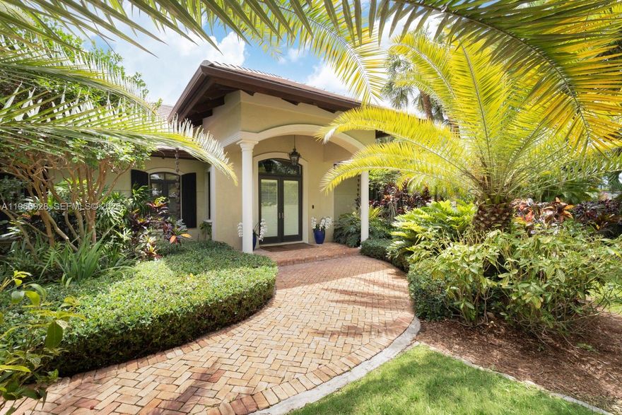 Fabulous 2007-built 5/5.5 family home on quiet great street in north Pinecrest.  High ceilings, impact glass windows and French doors, Egyptian marble floors, generator, gas cooktop, gas dryer, gas water heater, and a working fireplace.   Ideal split floor plan layout includes a fabulous and large open kitchen/ family room and breakfast room, 2-story primary suite wing, full cabana bath, 2-car garage, interior utility room, big walk-in closets, gorgeous built-in wet bar, and more!  Tranquil, private, and easy-to-maintain pool-patio-yard area includes Chicago brick, gazebo and turf.  All the best Pinecrest schools and central location to all the Village has to offer.