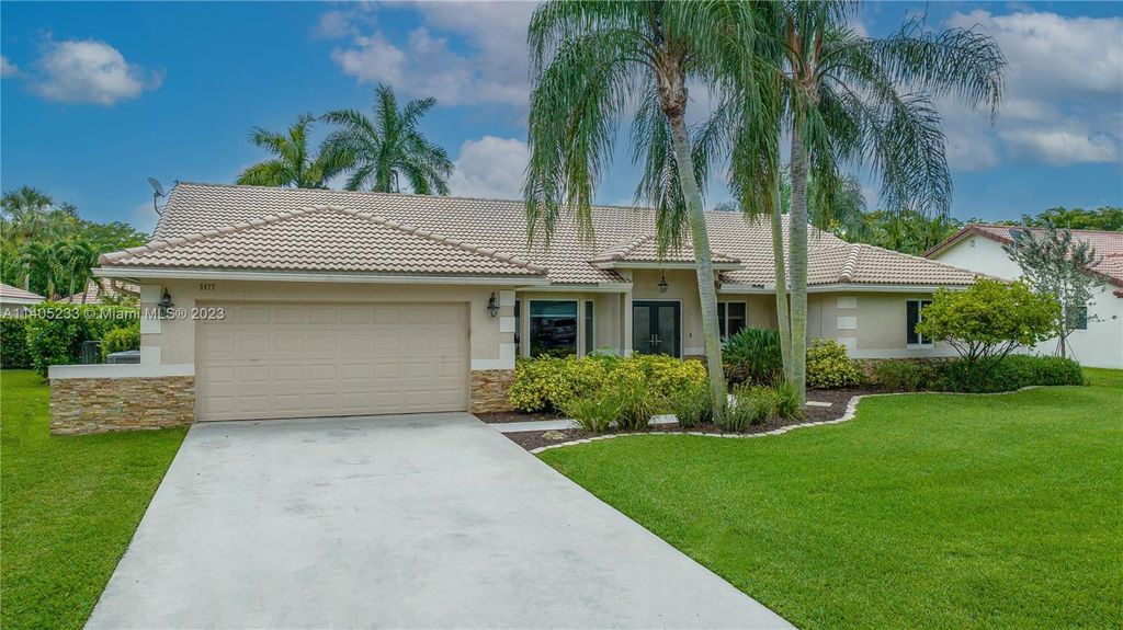 Photo of 5477 NW 86th Way, Coral Springs, FL 33067 (MLS # A11405233)