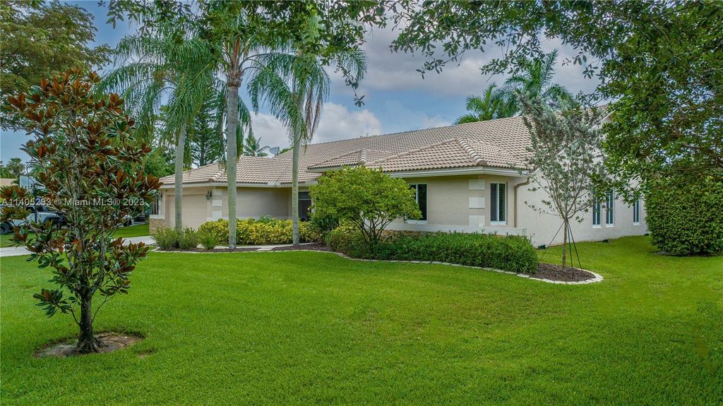 Photo of 5477 NW 86th Way, Coral Springs, FL 33067 (MLS # A11405233)