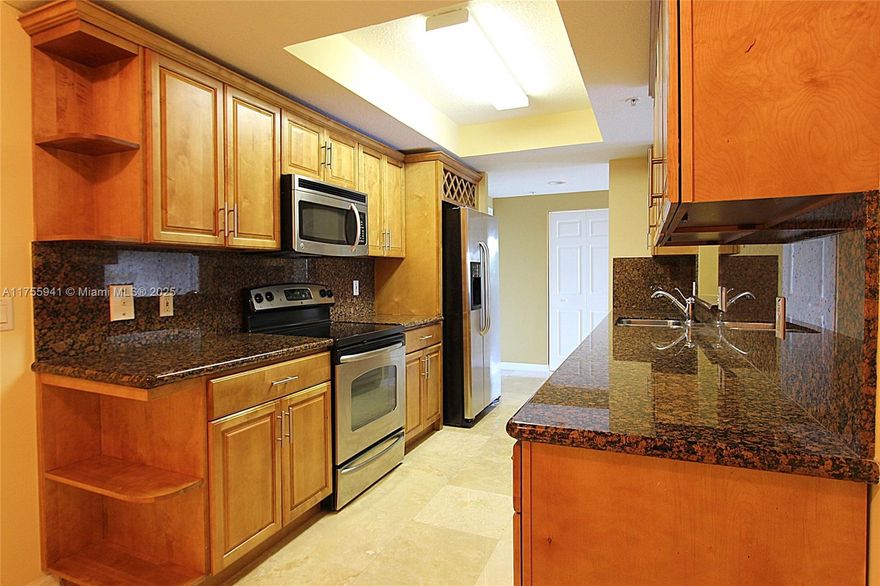 CENTRALLY LOCATED CONDO ON CORAL WAY! 2 ASSIGNED PARKING SPACES. Walking distance to Miracle Mile, shopping centers, and Public Transportation. HOA offers a Gym, a Pool, Cable/WIFI, and Water! The unit features a split bedroom floor plan with marble flooring throughout. Walk-in closets. Kitchen with granite countertops, wooden cabinetry, and stainless steel appliances. IN-UNIT WASHER AND DRYER.
