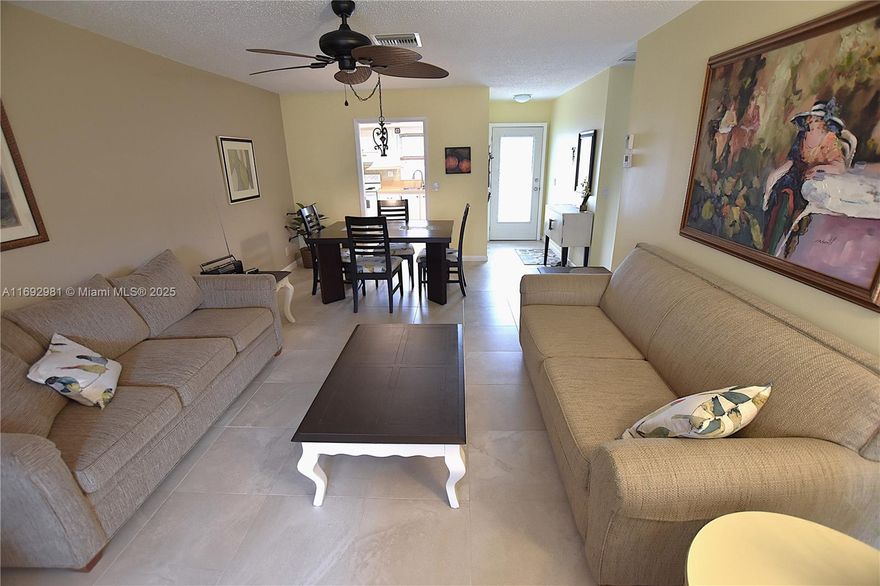 This charming move-in ready home in Dudley comes fully furnished, offering two bedrooms and stylish ceramic tile flooring throughout. It includes a cozy enclosed porch off the living room and a paved patio in the backyard. The updated bathroom features a tankless water heater for added efficiency, and the roof was replaced in 2019. This well-maintained condo also provides great amenities like tennis, pickleball, billiards, plus internet and basic cable covered in the maintenance dues.