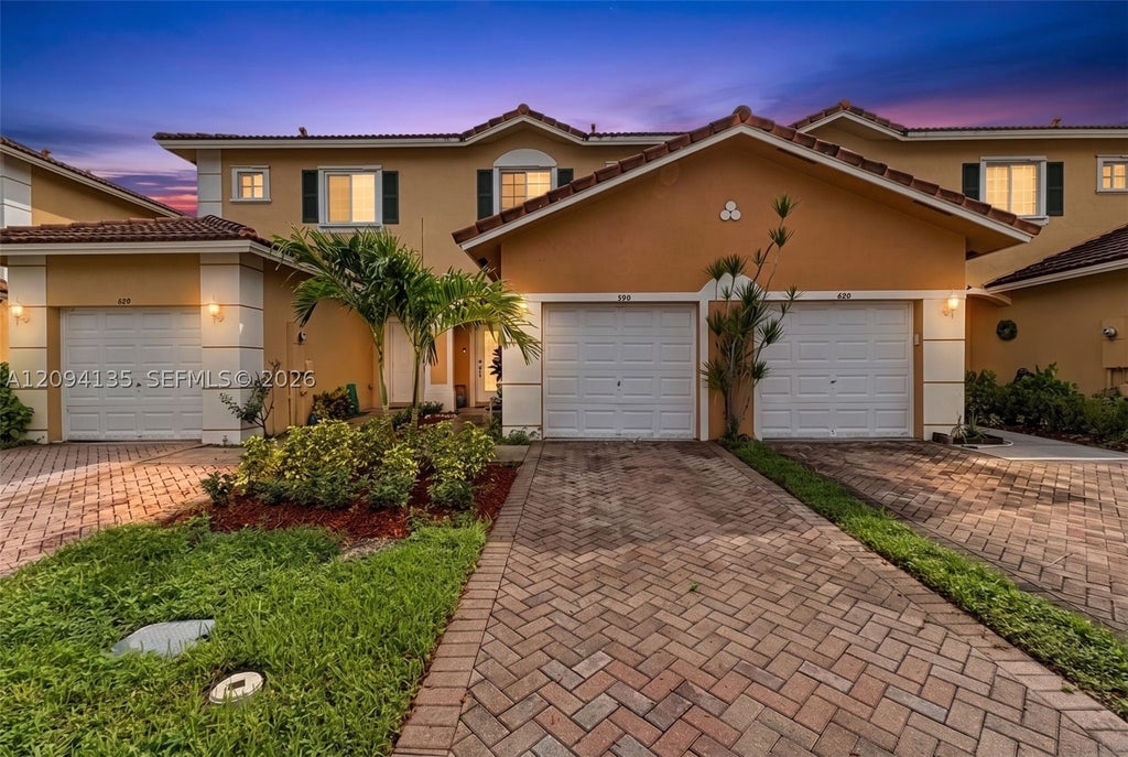 Photo of 590 Princess Drive, Margate, FL 33068 (MLS # A12094135)