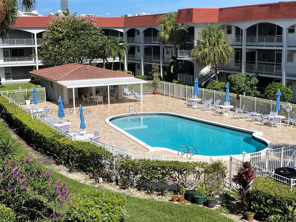 Photo of 581 Blue Heron Dr #307-B, Hallandale Beach, FL 33009 (MLS # A12078413)