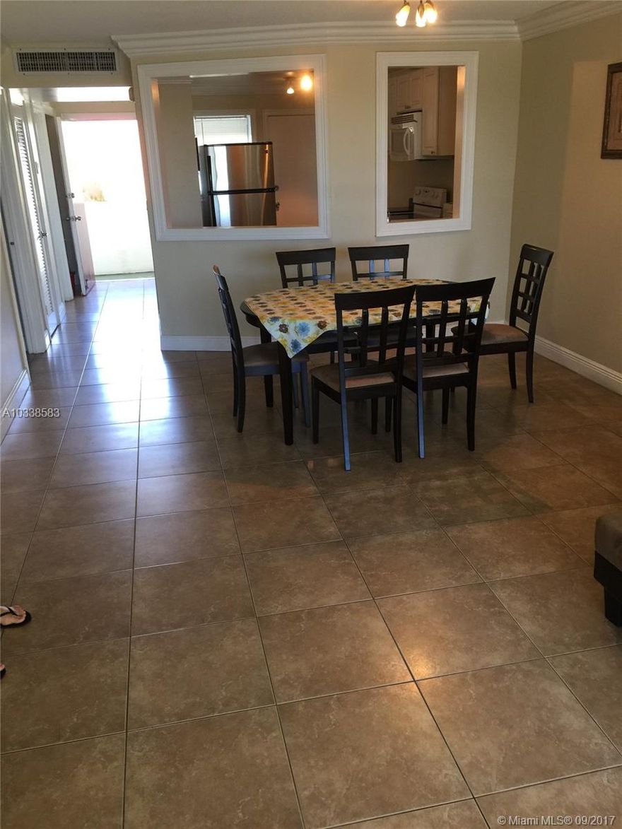 Comfortable 1 + den / Furnished / Location Location. /Fenced complex &  guard gate security , Close to the Skylake mall , publix , restaurants, minutes from aventura mall , easy access to I95/
