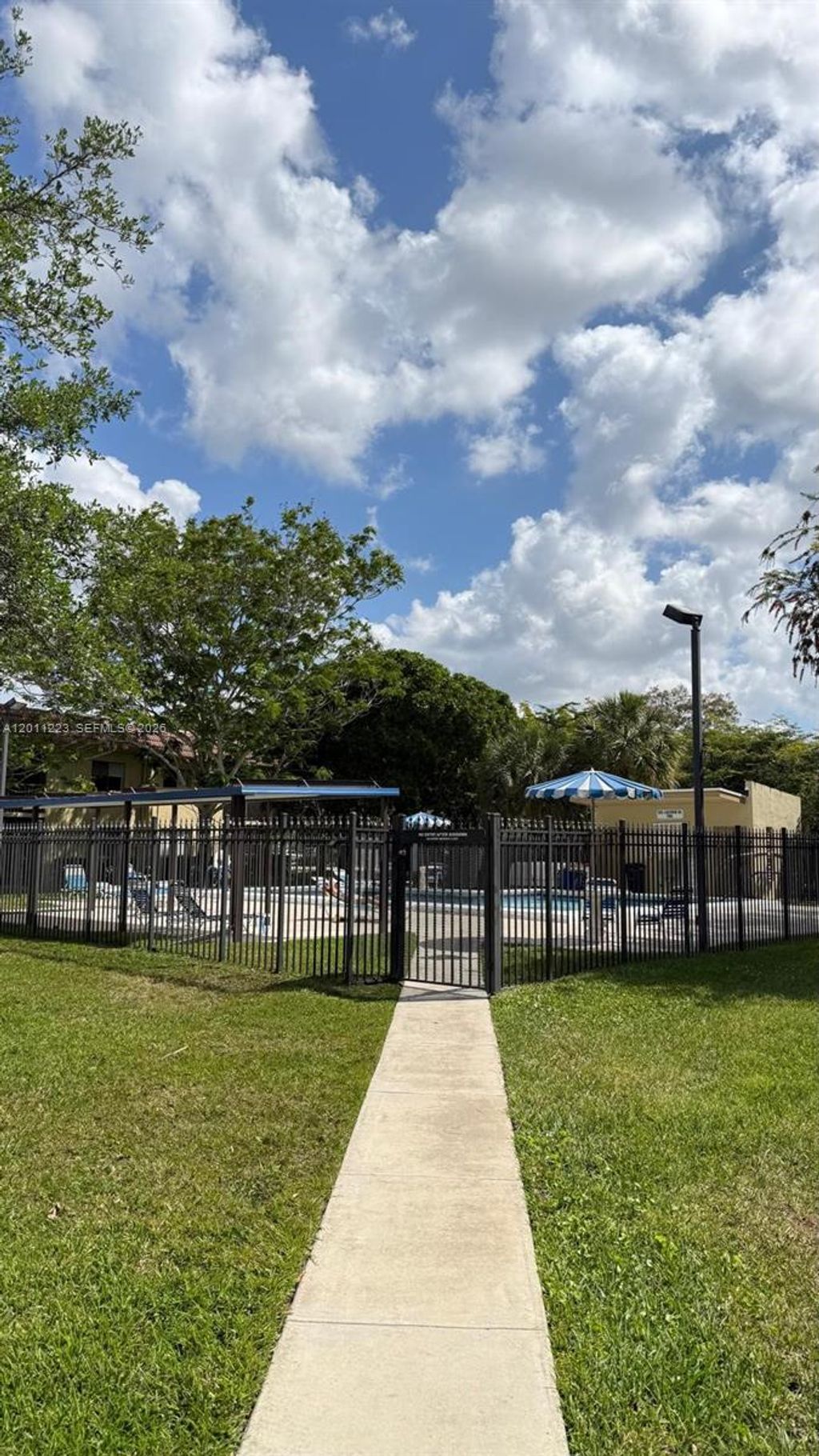 Photo of 325 Lakeview Dr #202, Weston, FL 33326 (MLS # A12011223)