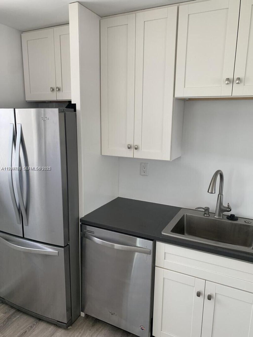 Photo of 707 Greenbriar Dr, Lake Park, FL 33403 (MLS # A11934828)