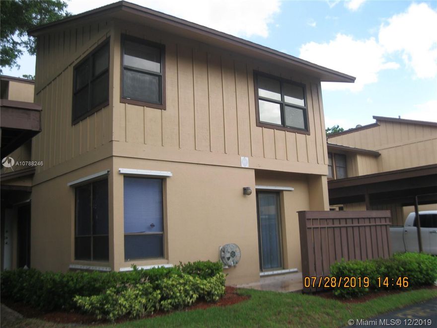 THREE BEDROOM-TWO AND HALF BATHROOMS-TOWNHOUSE-CARPORT-LARGEST FENCED IN PATIO-STORAGE CLOSET-STORAGE SHED-NEW CENTRAL A/C 2019-FRESHLY PAINTED-TILE AND LAMINATE FLOORS THROUGHOUT-GRANITE KITCHEN COUNTERTOPS-NEW BLINDS-MASTER BEDROOM AND BATHROOM SPLIT FROM TWO OTHER BEDROOMS-COMMUNITY POOL.