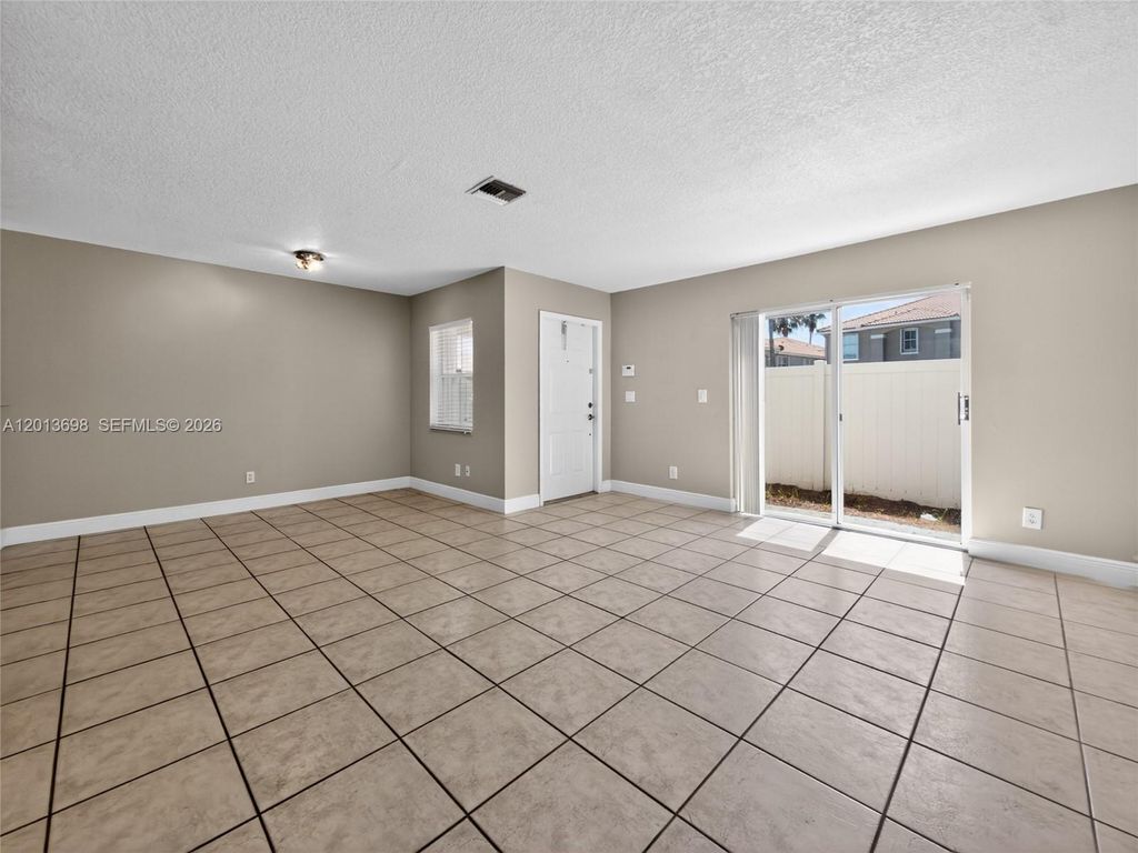 Photo of 5405 SW 125th Ter #5405, Miramar, FL 33027 (MLS # A12013698)