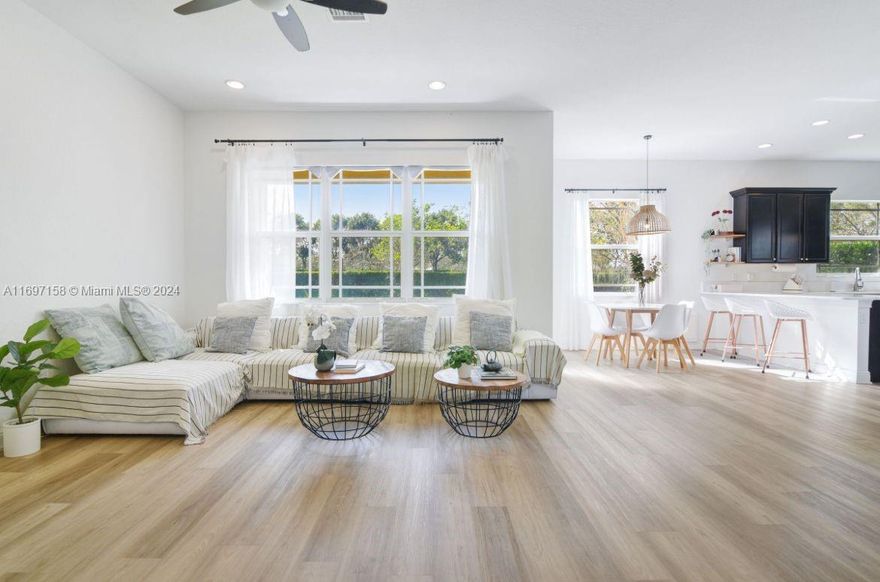 This stunning 4-bedroom, 4-bathroom home with a 2-car garage is located in the exclusive Miralago at Parkland Community. It features a gorgeous garden, new flooring, and fresh paint throughout. The first-floor bathroom includes a cabana-style opening, and the interior design allows the buyer to purchase select furniture. Residents of Miralago enjoy a luxurious lifestyle with a plethora of amenities. The  HOA includes all landscaping and provides 24-hour security. The community boasts 3 clubhouses, a gym, pools, a spa, a sauna, and a hammam. Social events for residents, playgrounds, tennis and basketball courts, playrooms, irrigation systems are all part of the package. Don't miss this incredible opportunity— the resale value of this property is set to soar in the coming years!