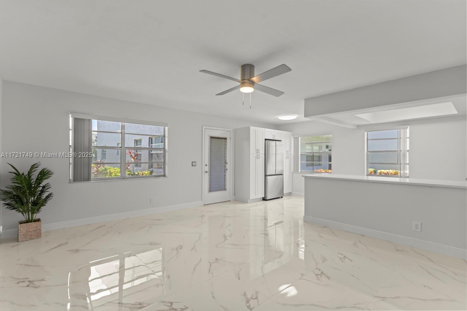 Stunning 2-bedroom, 2-bathroom first-floor condo available for annual rent in Kings Point. This light and bright unit features new appliances, modern cabinetry, and beautiful finishes, creating a contemporary and inviting atmosphere. Enjoy the convenience of an in-unit washer and dryer on the enclosed, air-conditioned patio. Parking is conveniently located right in front of the unit. Kings Point offers a vibrant lifestyle with various amenities, including a golf course, racquet courts, pools, social events, security, and more. Experience the best of modern living in this exceptional community!