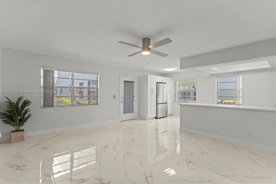 Stunning 2-bedroom, 2-bathroom first-floor condo available for annual rent in Kings Point. This light and bright unit features new appliances, modern cabinetry, and beautiful finishes, creating a contemporary and inviting atmosphere. Enjoy the convenience of an in-unit washer and dryer on the enclosed, air-conditioned patio. Parking is conveniently located right in front of the unit. Kings Point offers a vibrant lifestyle with various amenities, including a golf course, racquet courts, pools, social events, security, and more. Experience the best of modern living in this exceptional community!