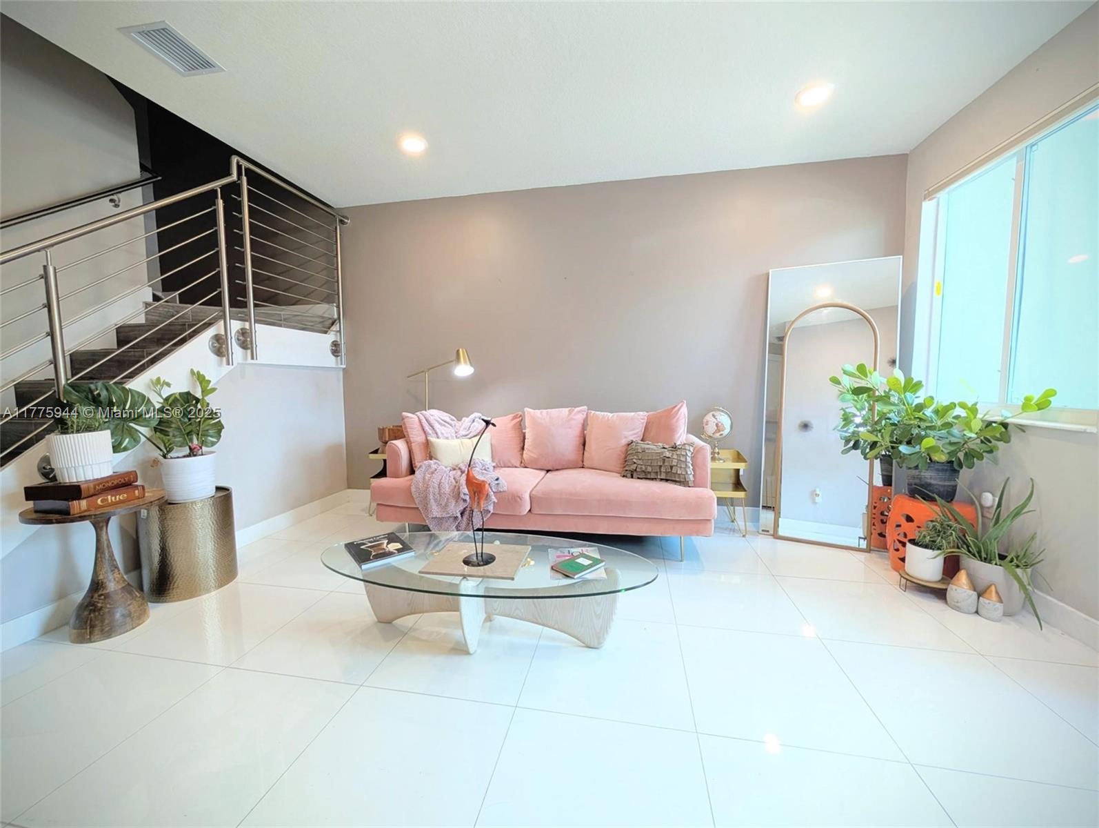 Townhouse located Landmark at Doral. Open layout, impact exterior doors and windows, porcelain tile, stainless stair railing, open kitchen with quartz countertops and stainless steel appliances, double oven & microwave, cooktop, one bedroom and a full bathroom on the first floor. Master bedrooms upstairs. Resort style clubhouse with pool, hot tub, fitness center, sauna, tennis courts, BBQ area, cabana, children's splash park. Landmark is in the heart of Doral, where residents enjoy elementary schools, shopping malls, restaurants, and more. It is close to Miami Int’l Airport, Turnpike and the Palmetto Expressway