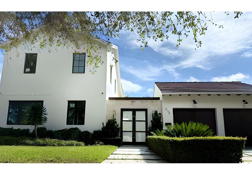 Exquisite Coral Gables treasure! Two stunning 2024-built homes on one prime lot, steps from UM, iconic Biltmore Hotel, and vibrant downtown Coral Gables. The luxurious Primary Home boasts 4 beds, 3 baths, a 2nd-floor laundry, grand great room, guest powder room, and a gourmet kitchen with top-tier Thermador appliances. The charming Guest Cottage, with 1 bed, 1 bath, features a rare fully equipped kitchen, doubling as a chic cabana bath. A sparkling plunge pool and 2 carports create an inviting poolside patio. Perfect for multi-generational living, in-laws, or guests, this entertainer’s paradise blends elegance and versatility in Coral Gables’ Golden Triangle.