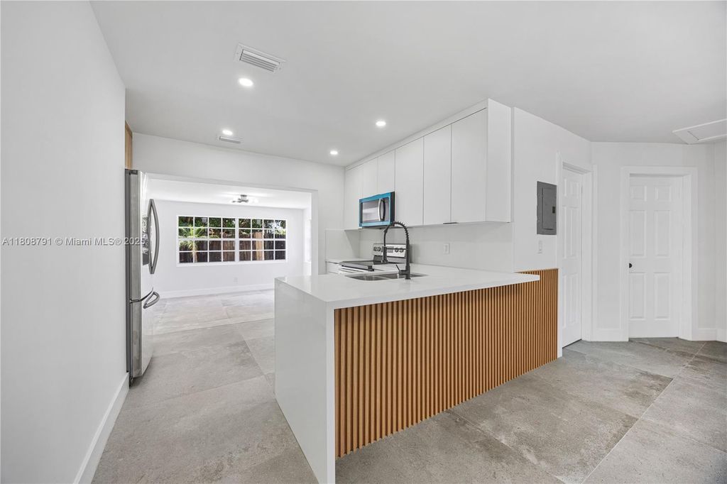 Photo of 3420 SW 12th Pl, Fort Lauderdale, FL 33312 (MLS # A11808791)
