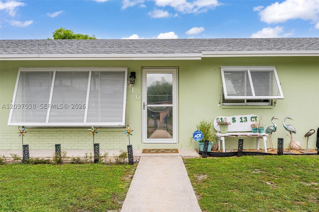 Photo of 516 S 13th Ct, Lantana, FL 33462 (MLS # A12037038)