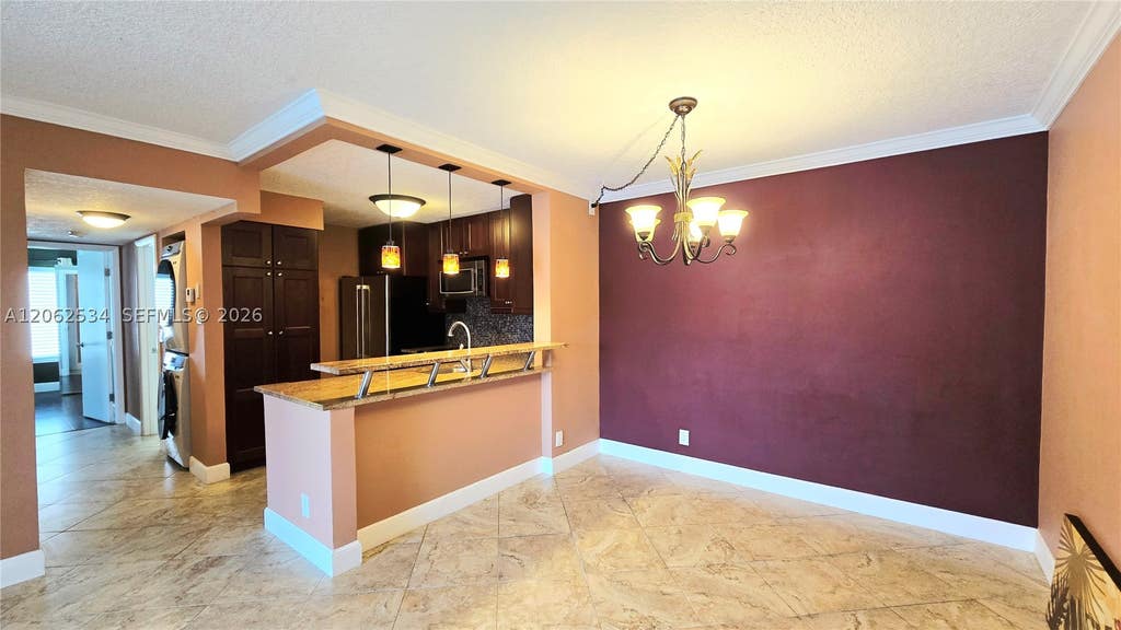 Photo of 202 Foxtail Dr #G2, Green Acres, FL 33415 (MLS # A12062534)