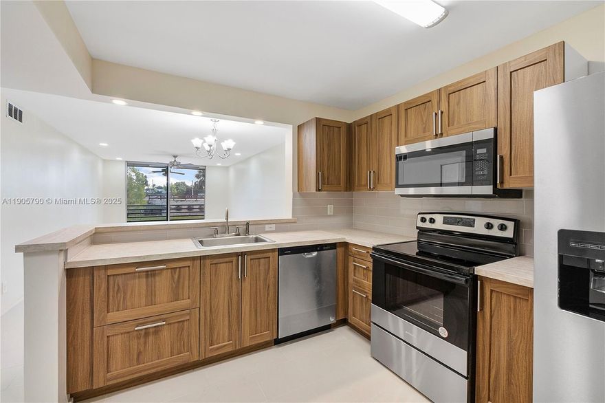 Welcome home to this beautifully remodeled ALL-AGES condo located on the 1st floor. Showcasing a spacious, open layout and a large screened balcony with tranquil pond views—perfect for morning coffee or sunset relaxation. The sleek, modern kitchen is fully updated with stylish finishes, ideal for your Instagram-worthy meals or TikTok cooking moments. This bright and airy residence features 1 bedroom, 1.5 baths, contemporary fixtures, and access to a guard-gated community for added security and peace of mind.