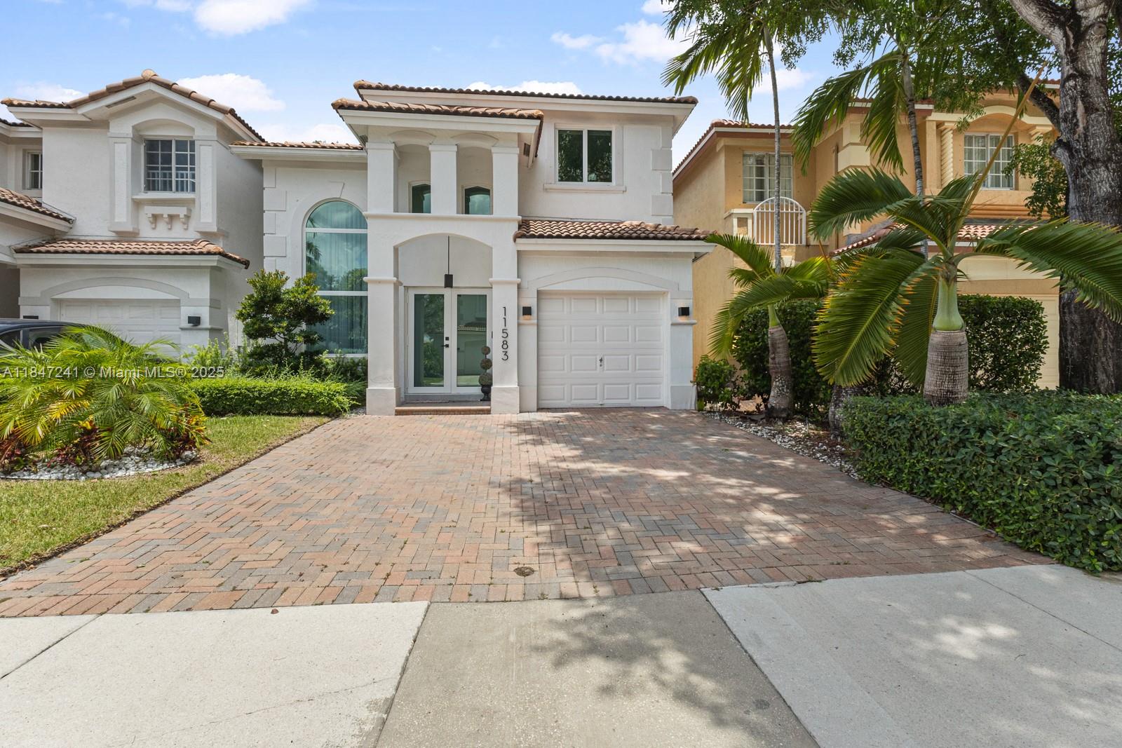Welcome to this cozy and beautifully updated home in the pristine gated community of Barbados in Doral. This 3-bedroom, 2.5-bath residence features a spacious open floor plan with soaring ceilings, a fully renovated kitchen with brand-new stainless steel appliances, and completely remodeled bathrooms. Enjoy a private fenced patio, ideal for gatherings and outdoor entertainment. Conveniently located just minutes from the Turnpike exit and close to the Dolphin and Palmetto expressways, this home offers comfort, style, and accessibility