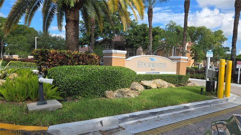 Photo of 8851 Wiles Rd #103, Coral Springs, FL 33067 (MLS # A11868838)