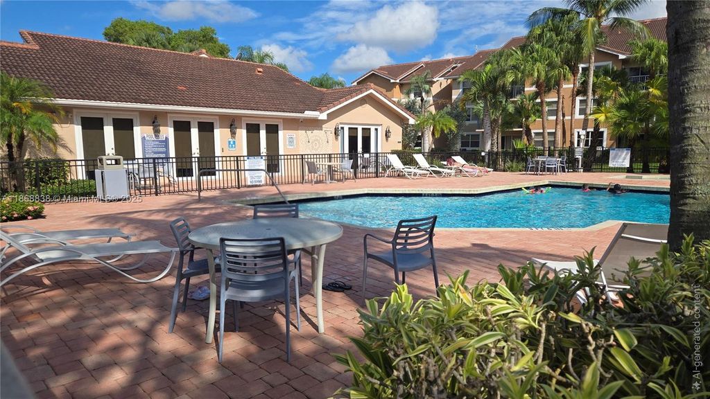 Photo of 8851 Wiles Rd #103, Coral Springs, FL 33067 (MLS # A11868838)