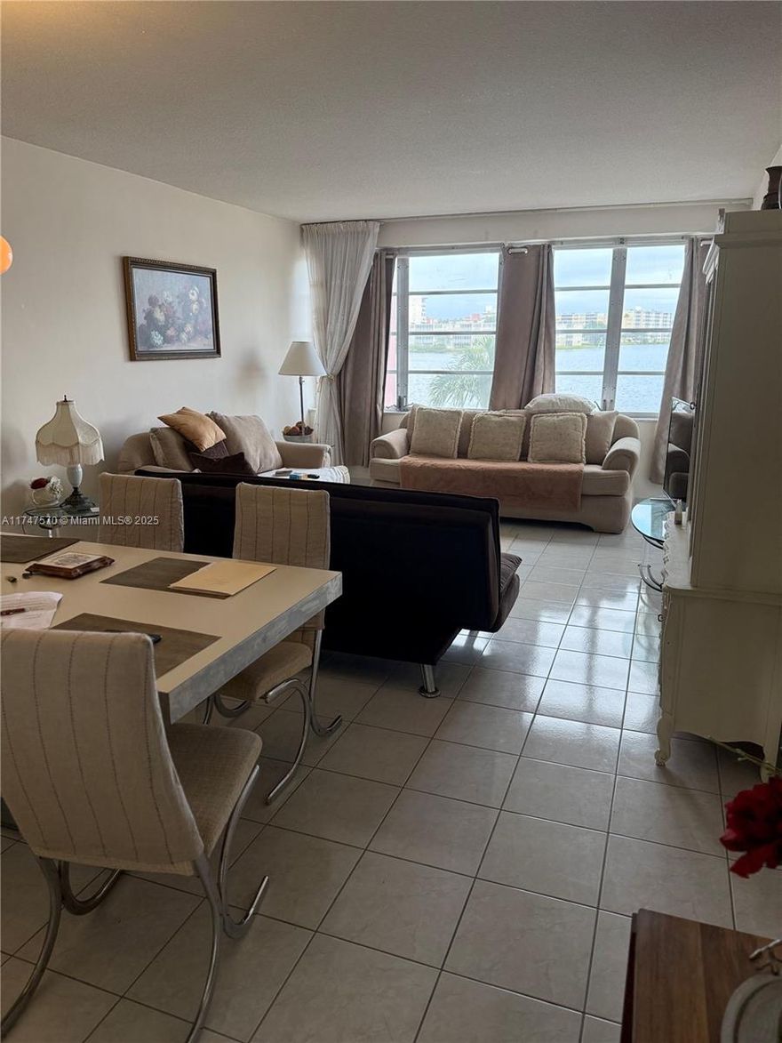 BEAUTIFUL 1/1 CONDO.  IN EXCELLENT CONDITION.  SPACIOUS AND LAKE FRONT VIEW FROM LIVING AND MASTER BEDROOM.  LOCATION, LOCATION, LOCATION.  CLOSE TO SKYLAKE SHOOPING CENTER, I-95, BISCAYNE BLVD.  2 POOLS, CLUBHOUSE, GYM.  CERAMIC FLOOR, WALKING CLOSET.