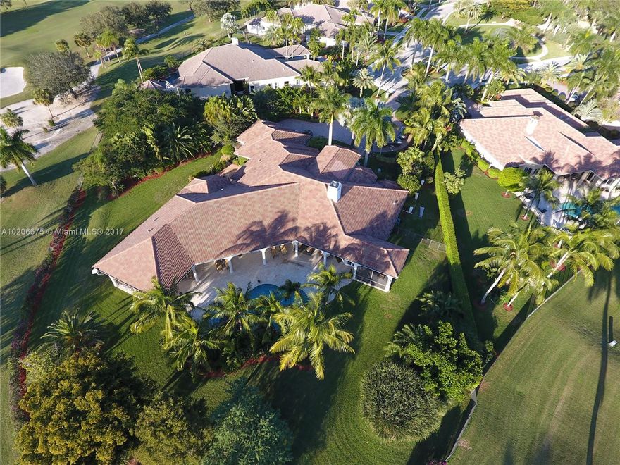 SET ON A PRIVATE 48,000SF CUL DE SAC LOT IN THE GATED WESTON HILLS CC. THIS 8,000SF 6 BED/7.5 BATH/DEN/THEATRE CUSTOM BUILT HOME FEATURES AN OPEN FLOOR PLAN WITH WONDERFUL LIVING AND ENTERTAINING SPACE. FLOOR TO CEILING WINDOWS PROVIDE AN IMPRESSIVE BACKDROP FOR ANY GATHERING. WELL APPOINTED KITCHEN WITH ALL THE TOP APPLIANCES. GENEROUS MASTER WING OFFER HIS AND HER MASTER BATHROOMS. EXPANSIVE OUTDOOR LIVING AREA W/ HEATED POOL, HOT TUB, & SUMMER KITCHEN. 3-CAR GARAGE. THIS IS THE LARGEST LOT IN WHCC.