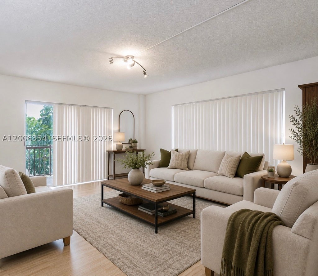 Photo of 4174 Inverrary Dr #202, Lauderhill, FL 33319 (MLS # A12006354)