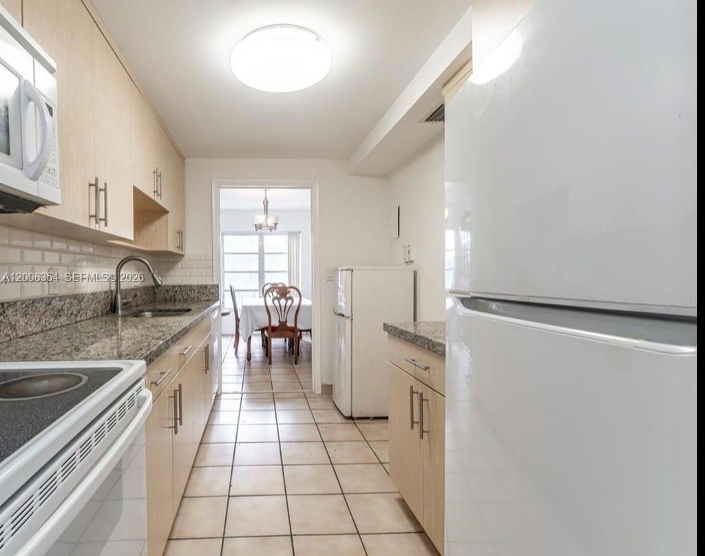 Photo of 4174 Inverrary Dr #202, Lauderhill, FL 33319 (MLS # A12006354)