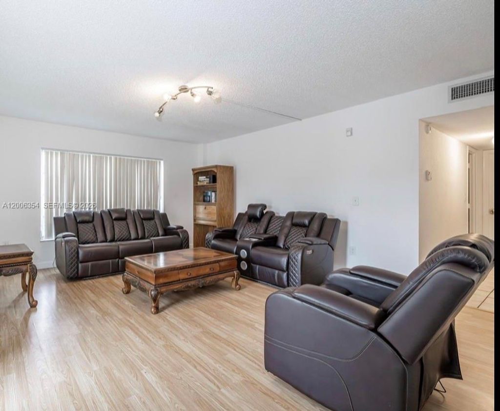 Photo of 4174 Inverrary Dr #202, Lauderhill, FL 33319 (MLS # A12006354)