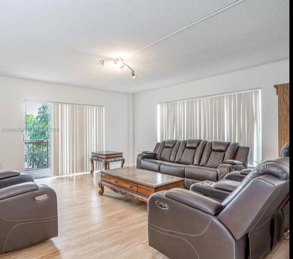 Photo of 4174 Inverrary Dr #202, Lauderhill, FL 33319 (MLS # A12006354)