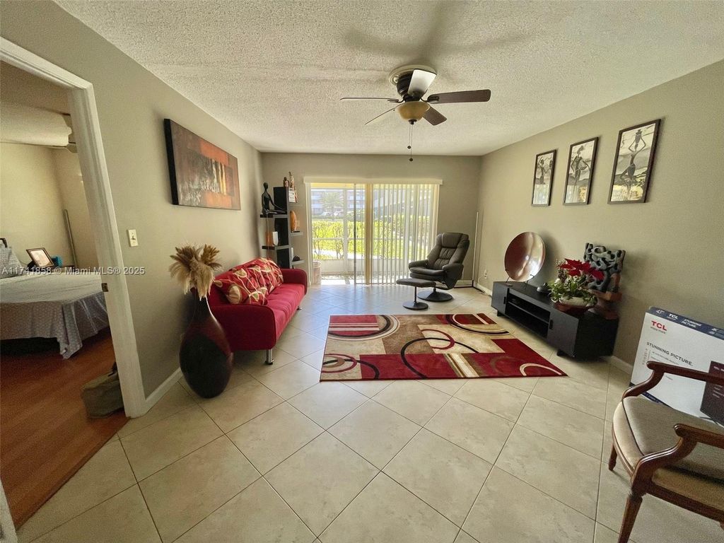 Photo of 4700 Washington St #106, Hollywood, FL 33021 (MLS # A11741858)